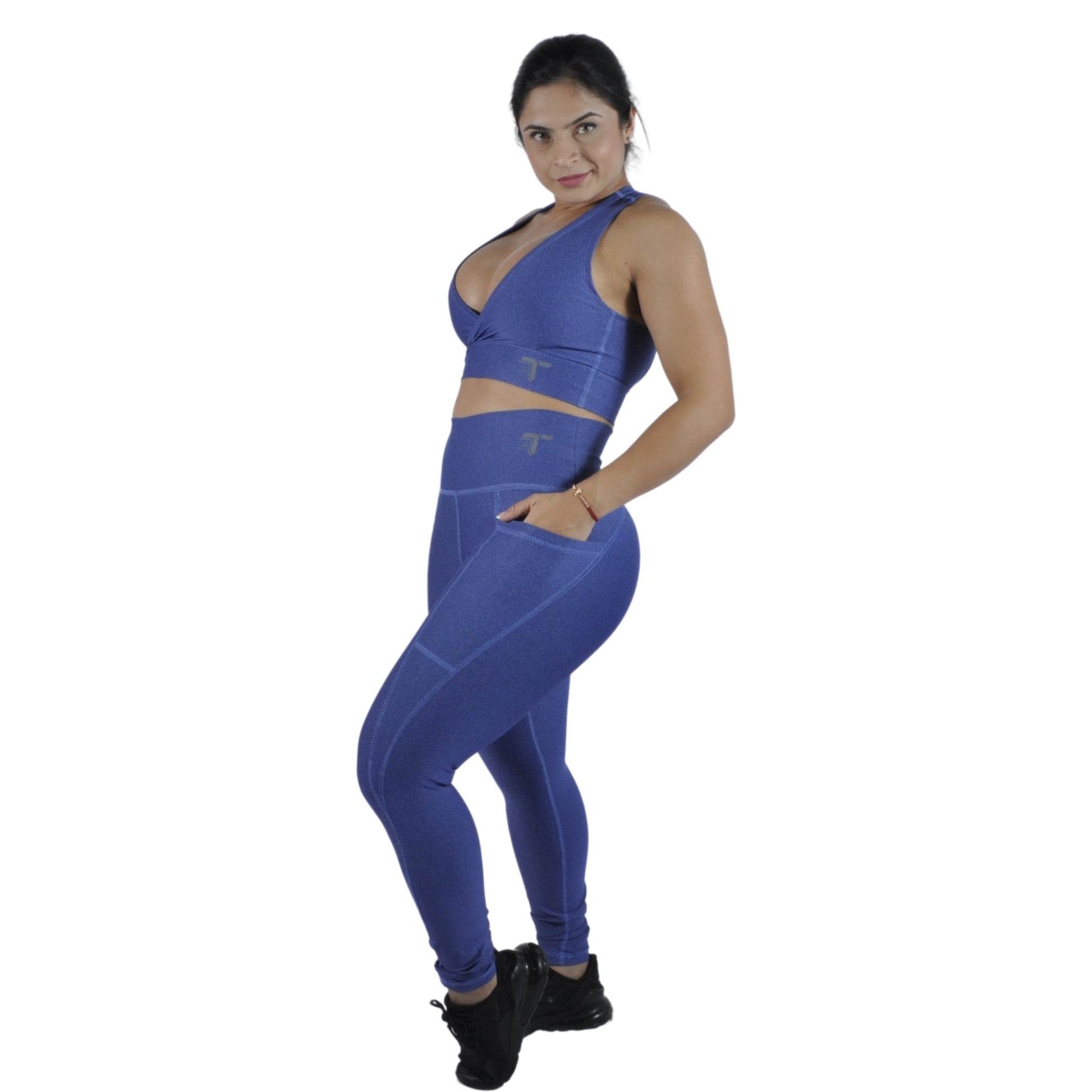 Leggins deportivo mujer bolsillo lateral azul jaspeado At Fit Sport Colombia