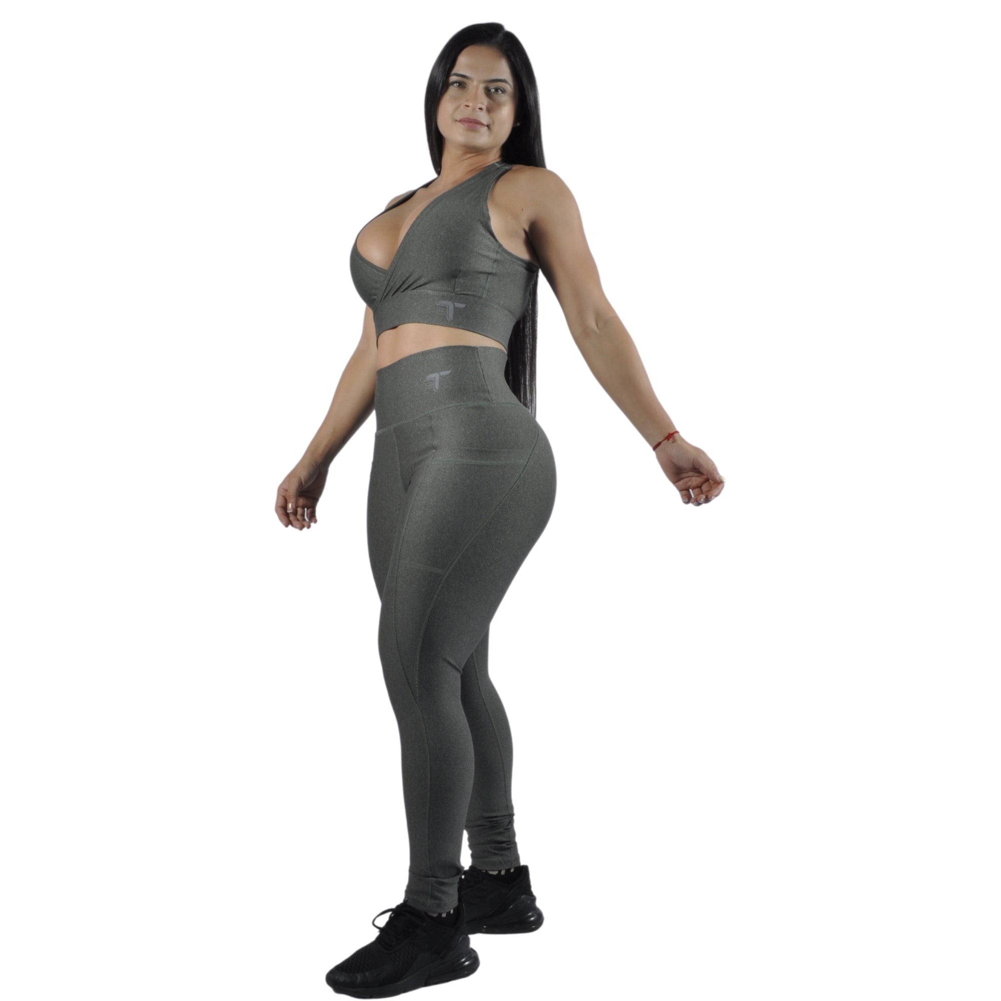 Leggins deportivo mujer bolsillo lateral verde jaspeado At Fit Sport Colombia